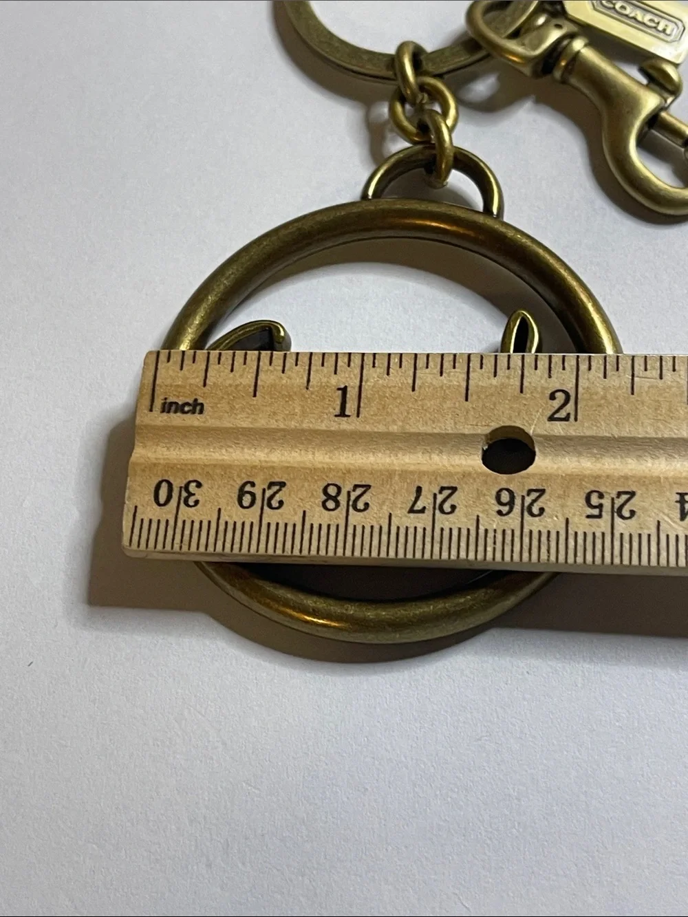 Coach Large Brass-Tone Script Circle Keyring/Bag Charm